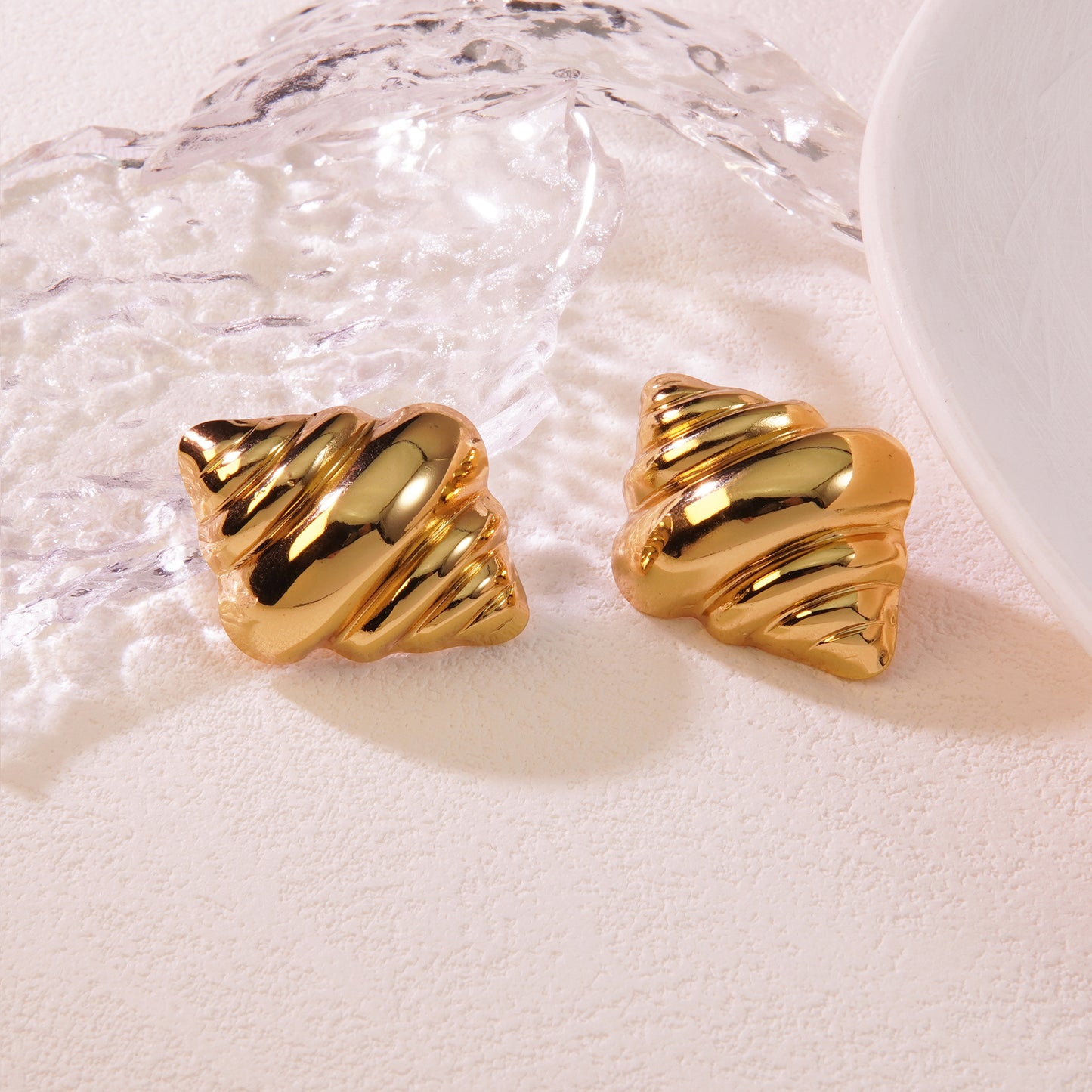 Aretes caracol acero