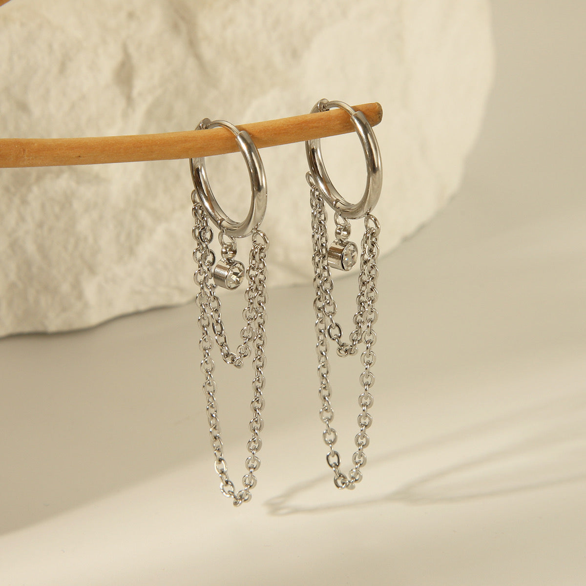 Aretes largos capas
