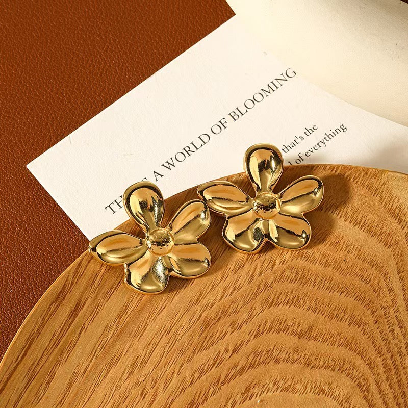 Aretes flor chica