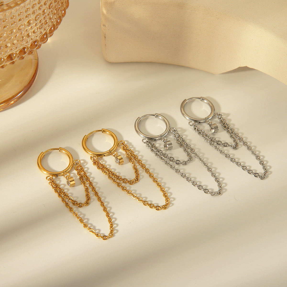 Aretes largos capas