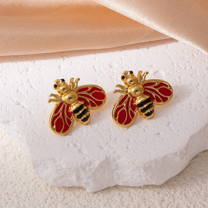 Aretes abeja alas rojas