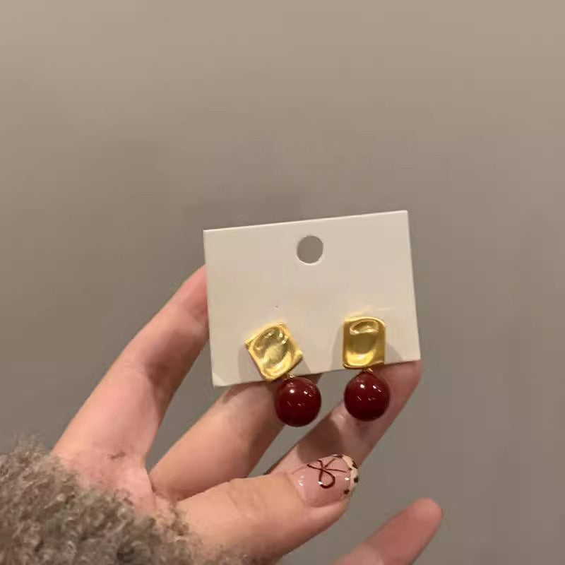 Aretes perla linda tinta