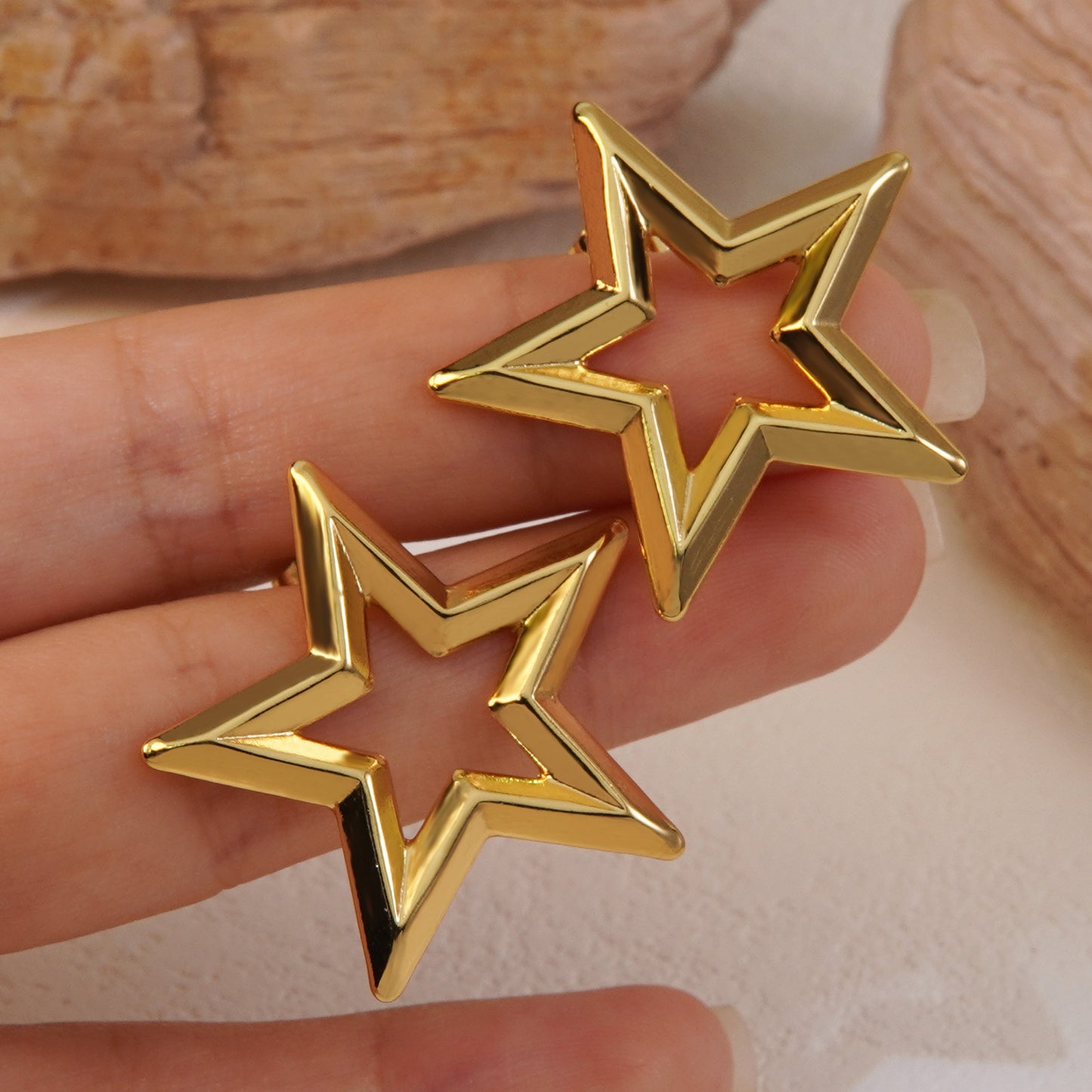 Aretes estrella contorno