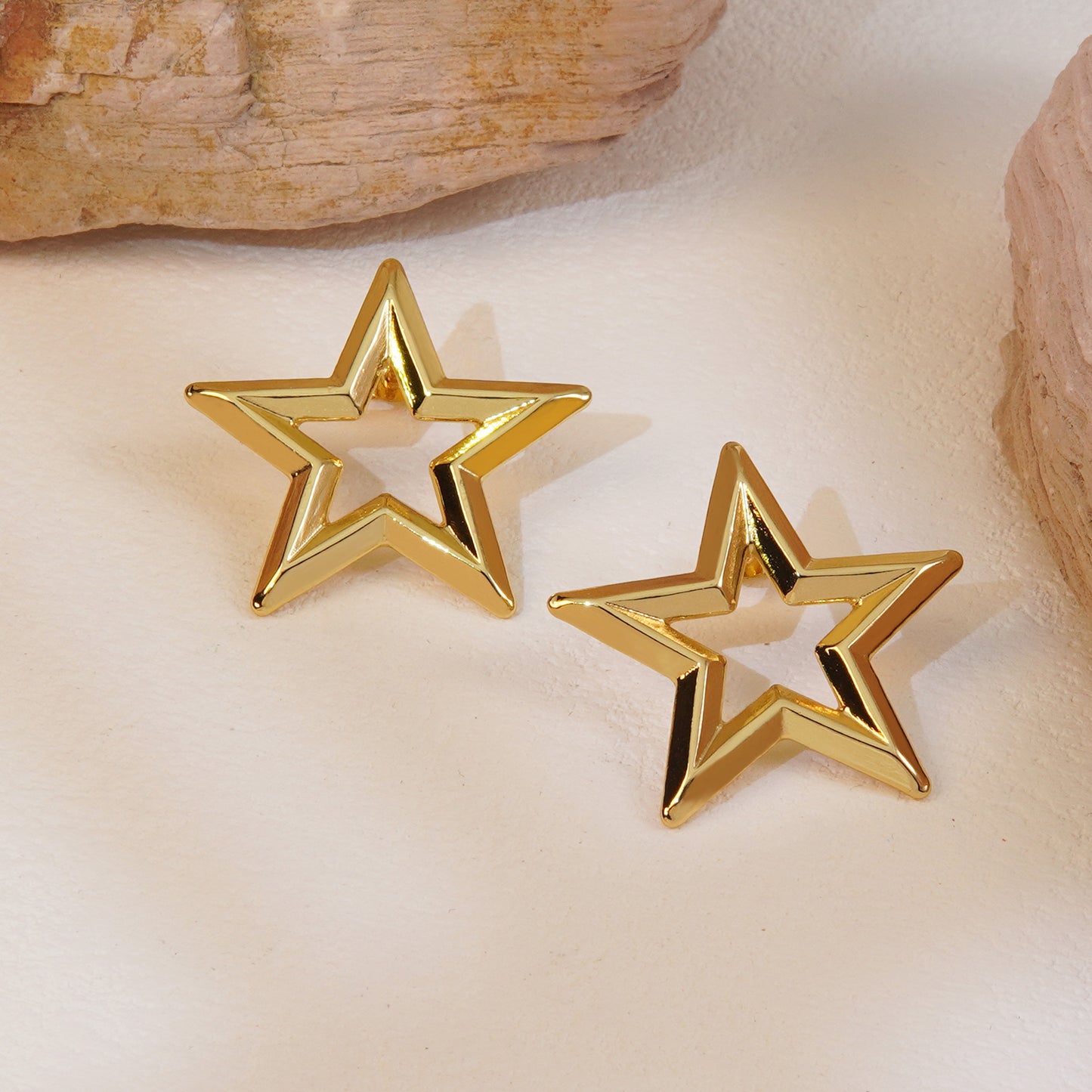 Aretes estrella contorno