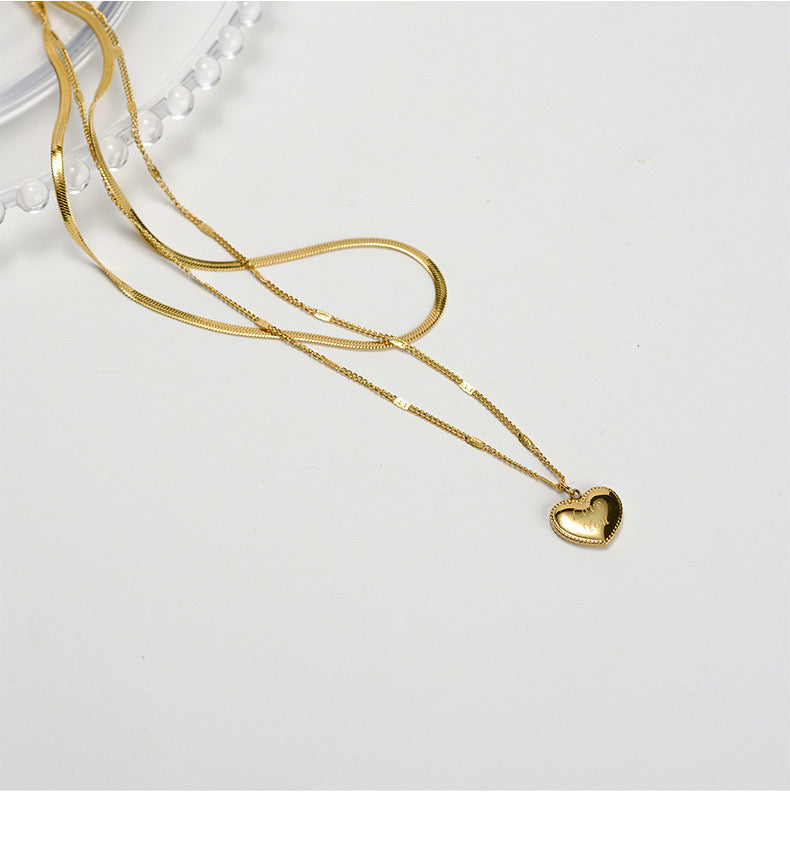 Collar doble corazón planchado