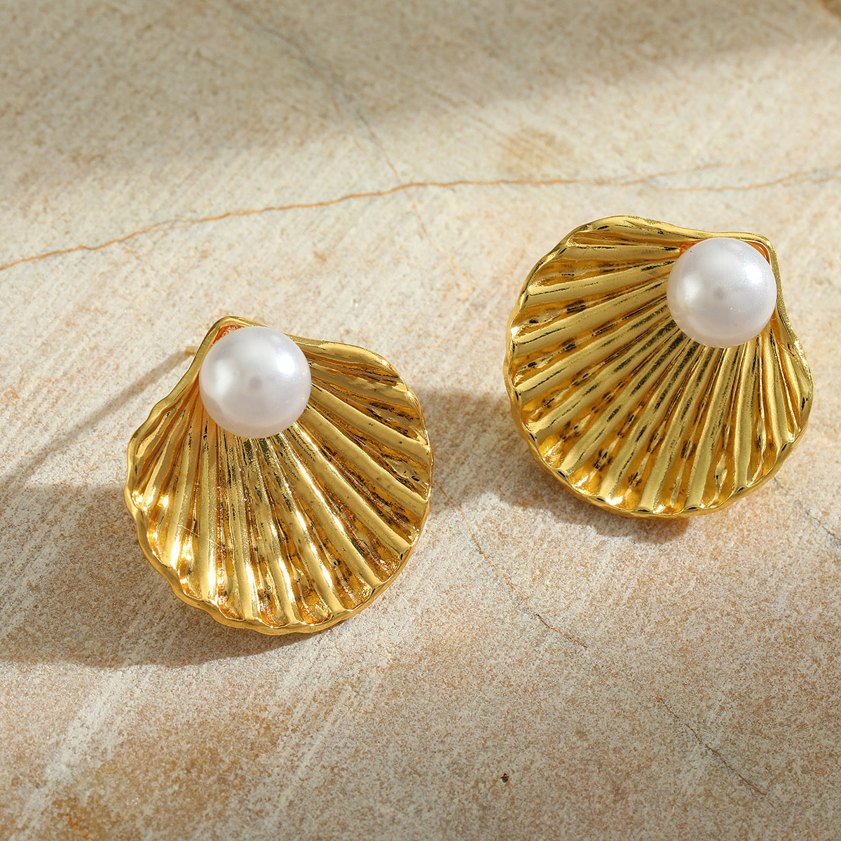 Aretes concha con perlita