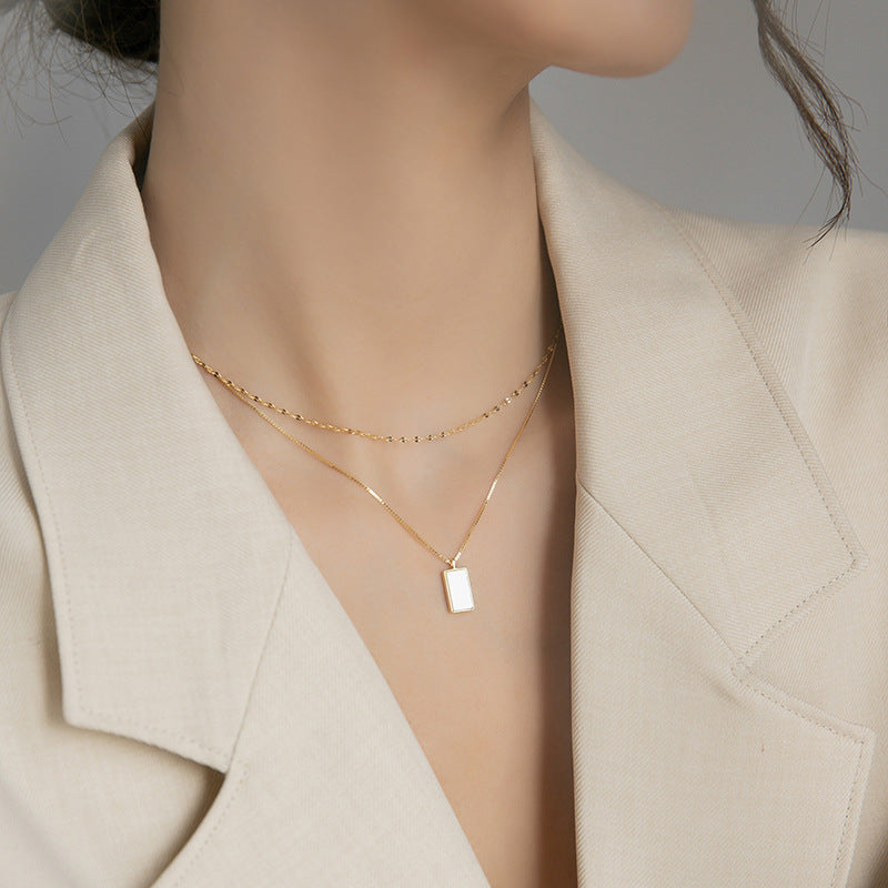 Collar doble con dije de madre perla
