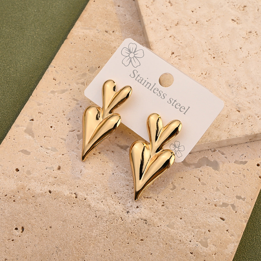 Aretes doble corazón picudo