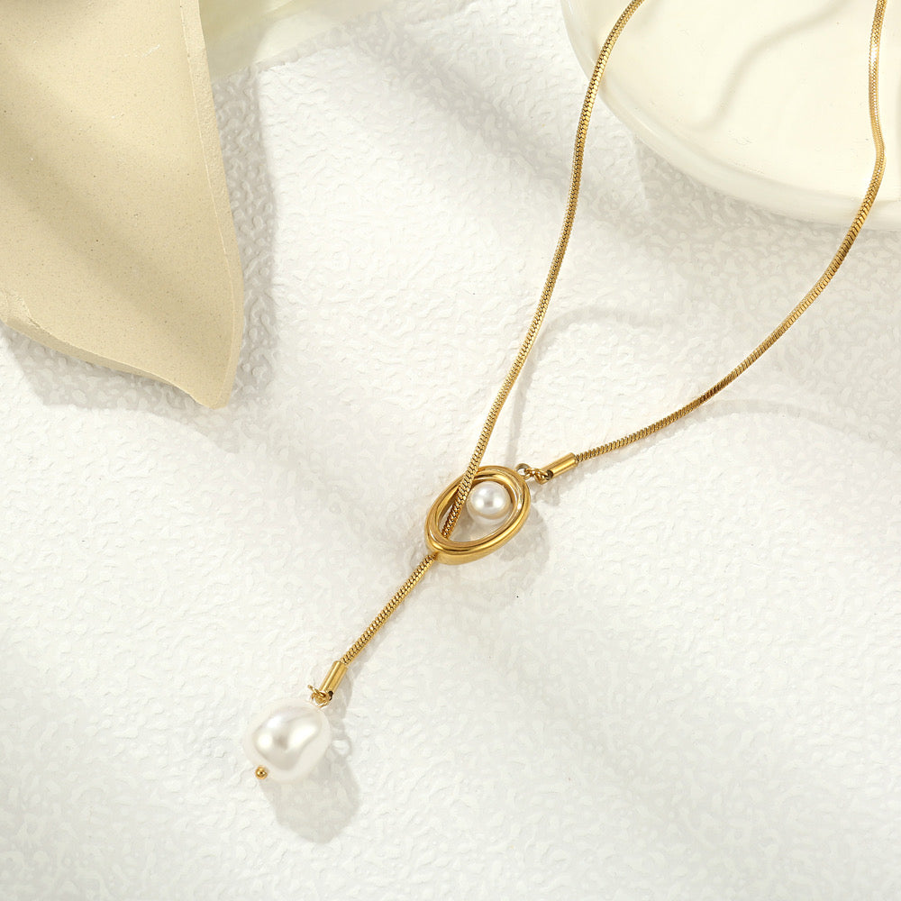 Corbatero elegante con perla dorado