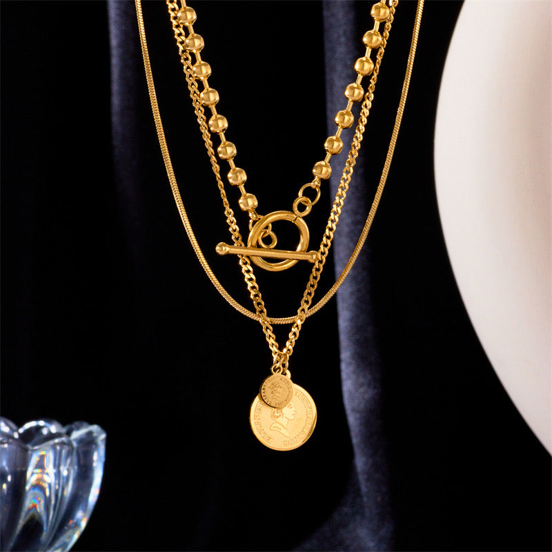 Collar triple moneda