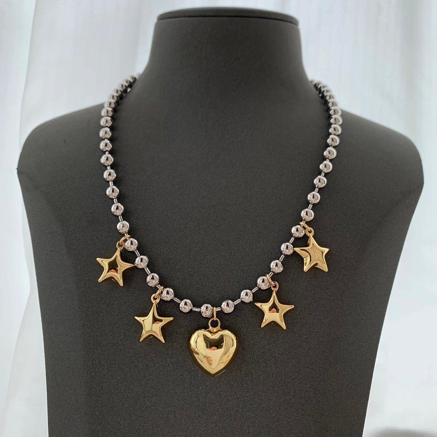 Collar corazones estrellado