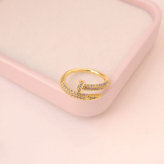 Anillo clavo diamantes