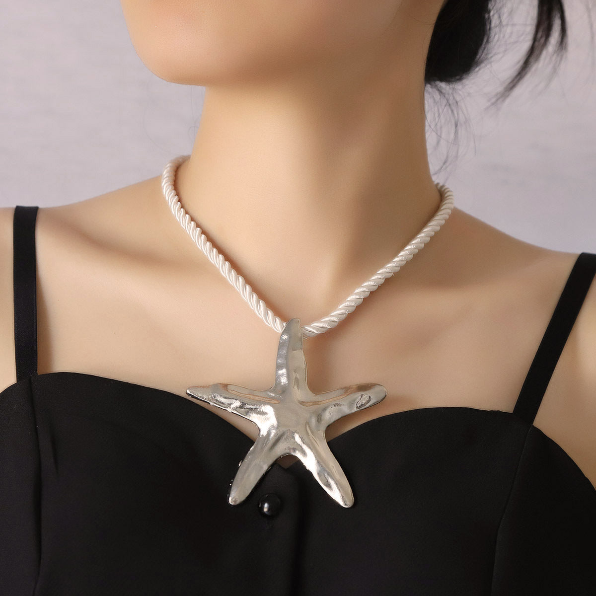 Collar tejido estrella brillosa