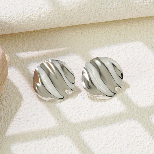 Aretes boton arrugado plata