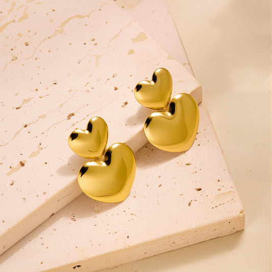 Aretes doble corazón brilloso