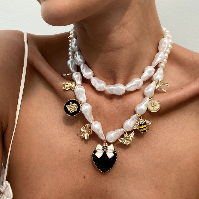 Collar doble de bichos aperlado