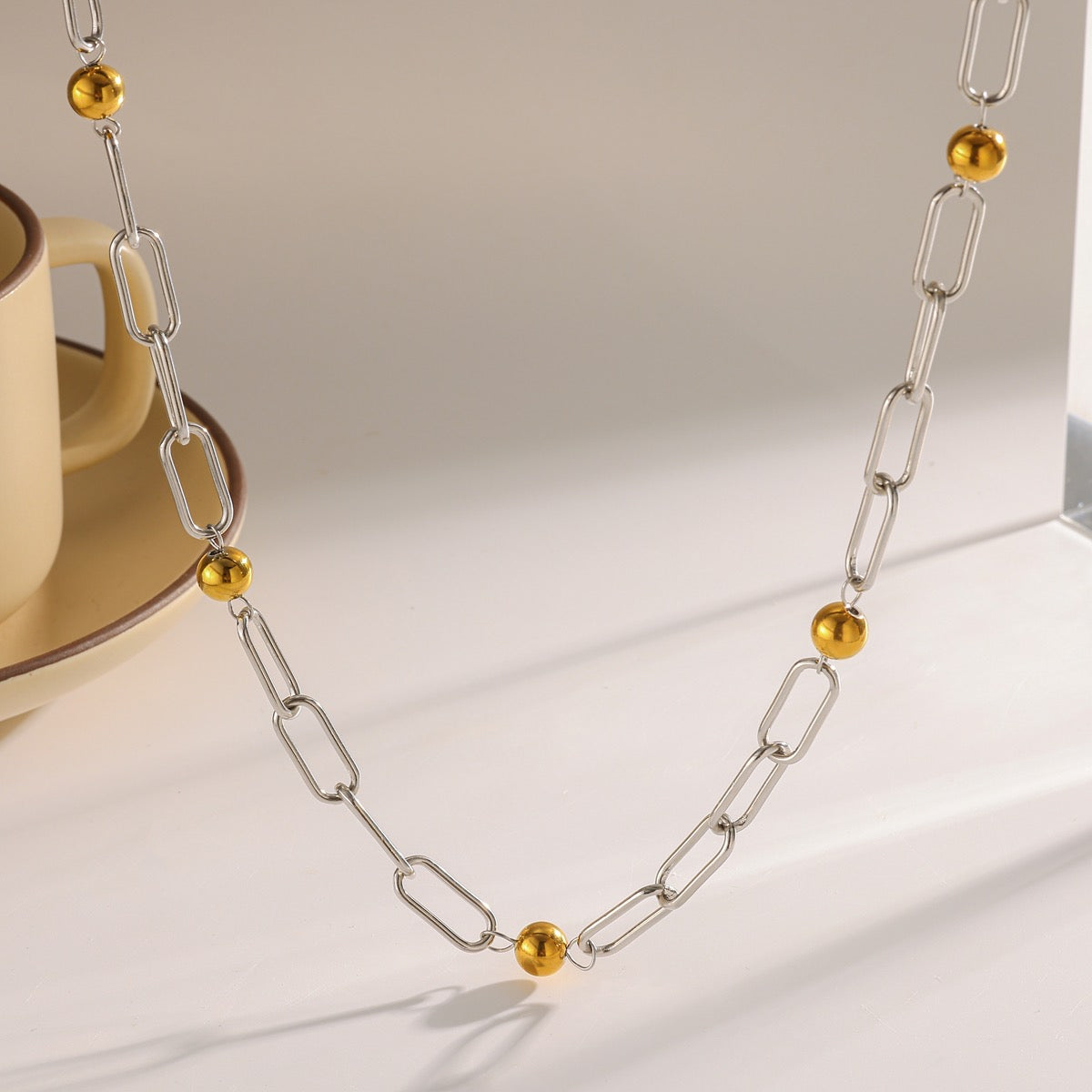 Collar estilo cubano bitono perlas doradas