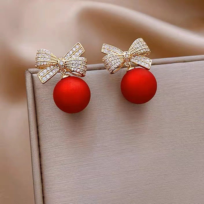 Aretes perla roja