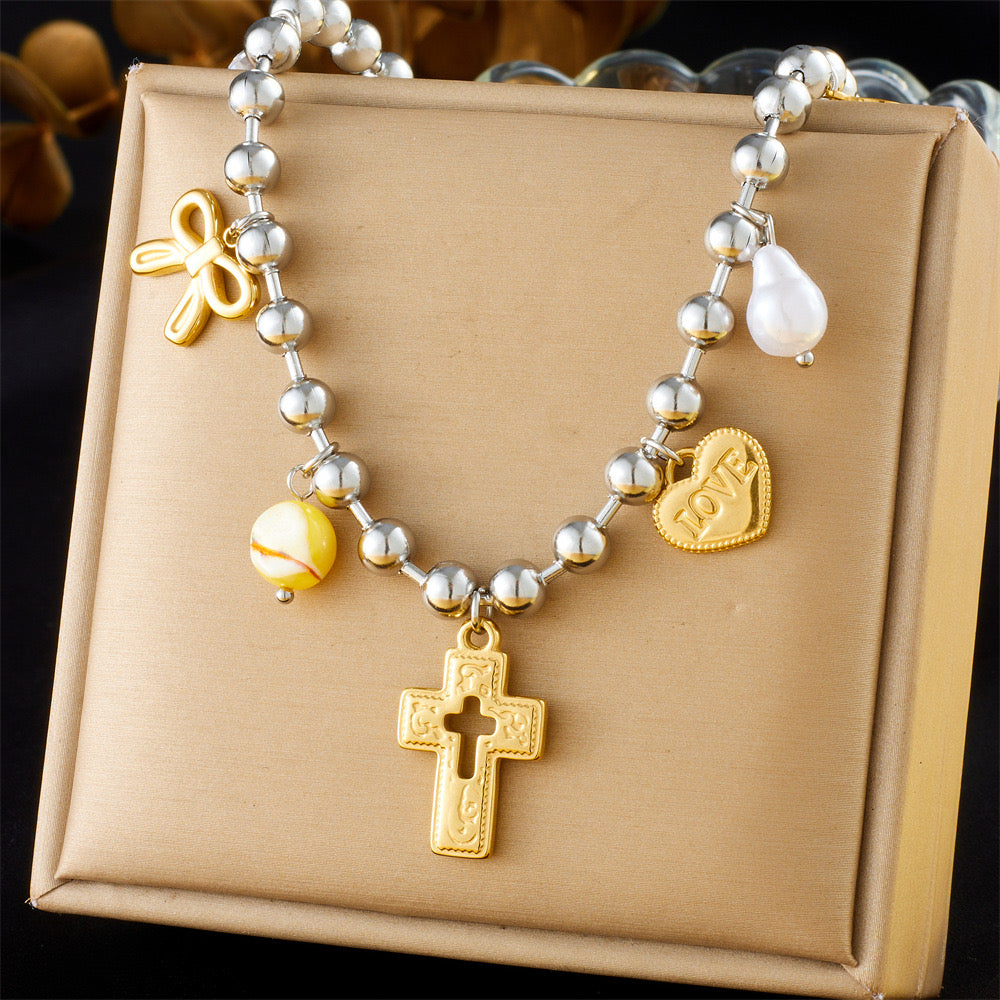 Collar bitono cruz