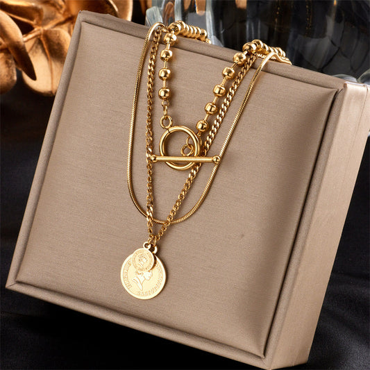 Collar triple moneda