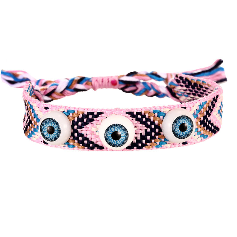 Pulsera tejida ojo redondo