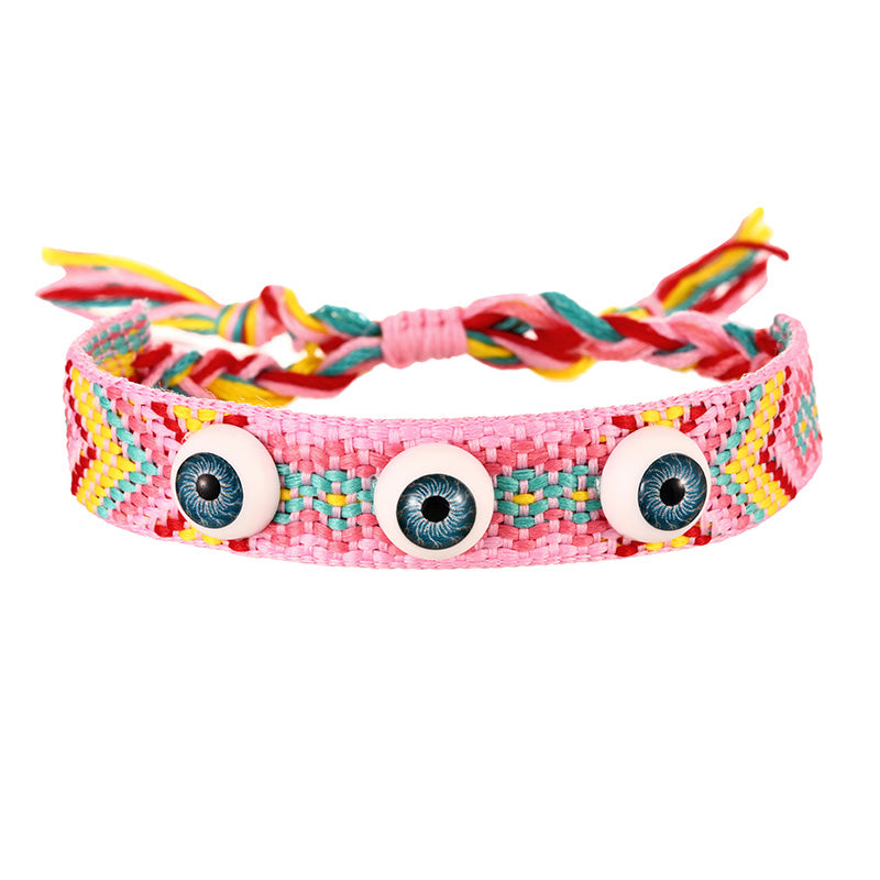 Pulsera tejida ojo redondo